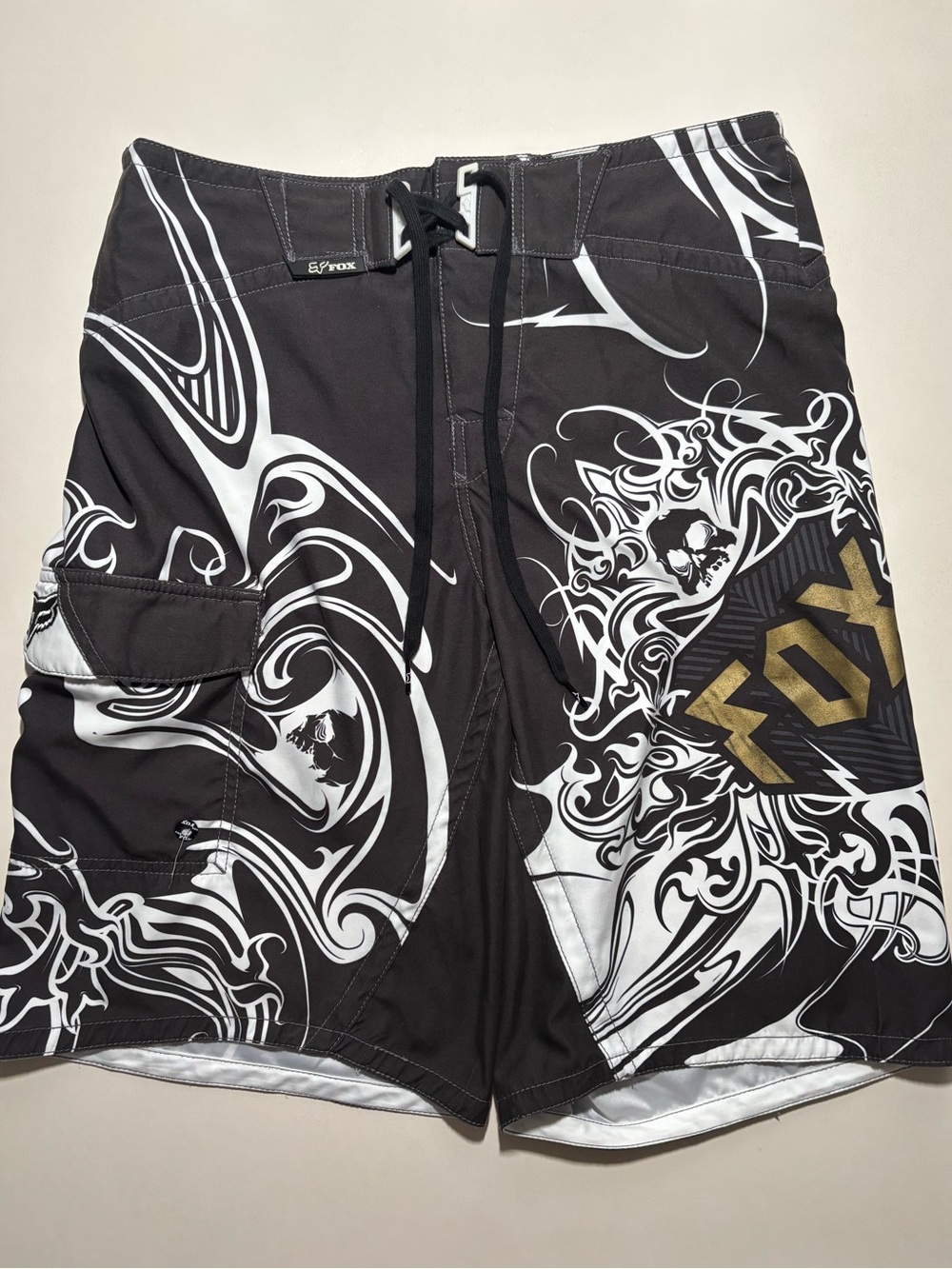 Y2K Tribal fox racing skull all over print swim shorts / board shorts